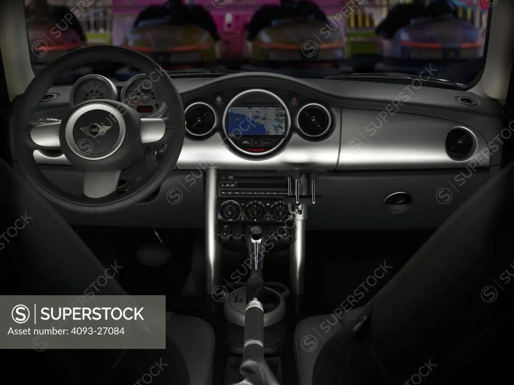 2006 Mini Cooper dark green emerald green interior shot looking at the dashboard stereo G.P.S. global positioning system
