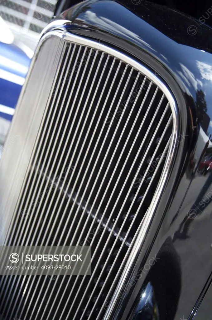 A close up detail shot of an early 1930's Chevrolet Hotrod and its grill