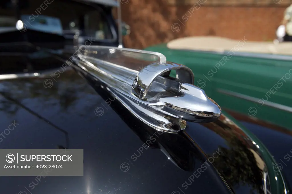 A close up detail shot of a 1948 Chevrolet Fleetline hood ornament