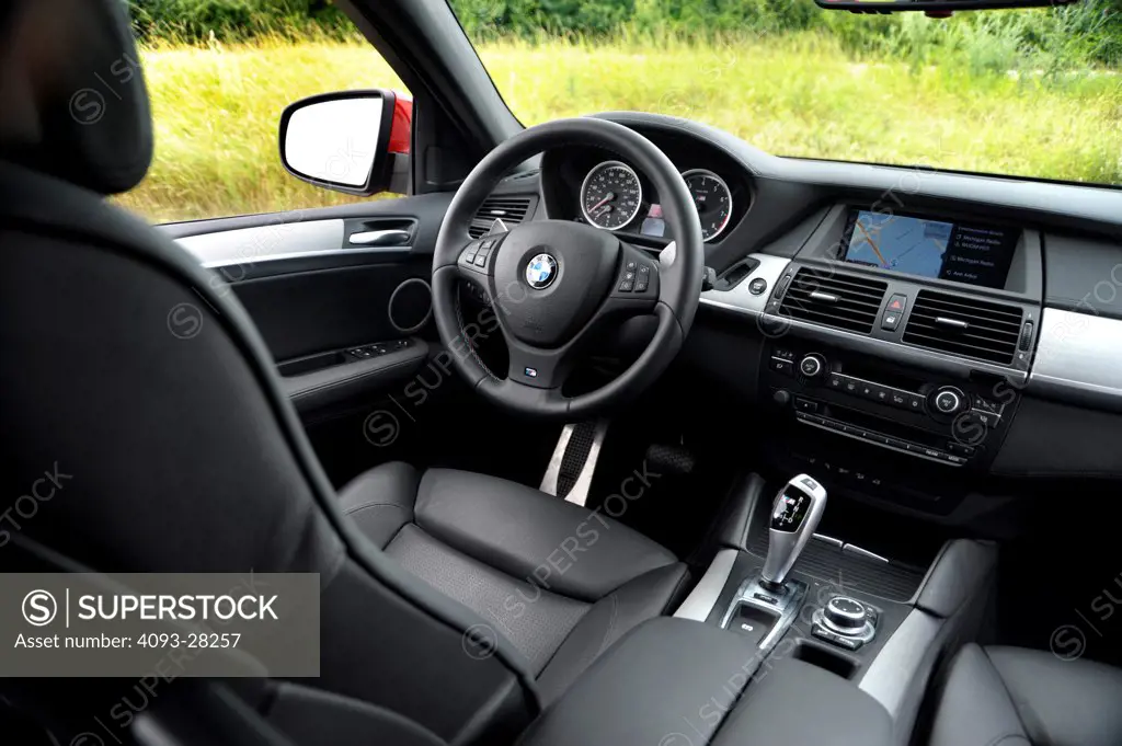 2010 BMW X6 M interior with dashboard and seat