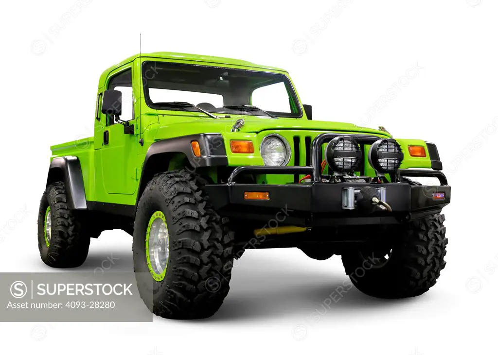 Front 3/4 static view of a green custom 2012 Jeep Wrangler TJ pickup truck with large wheels in the studio