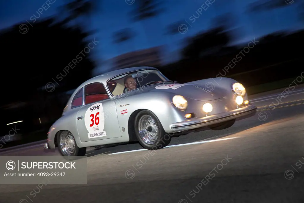 1954 Porsche 356 Carrera on road at night, front 7/8
