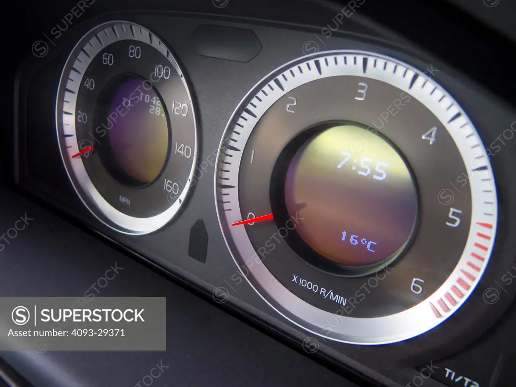Interior view of a 2012 Volvo S80 showing the speedometer, tachometer and odometer in the instrument panel.