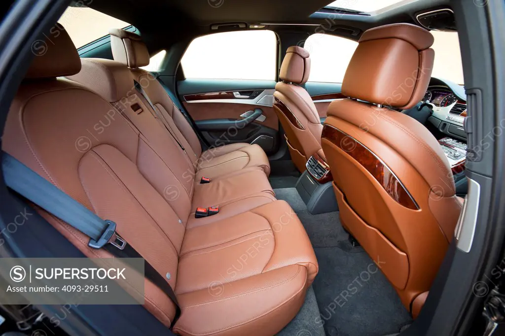 Interior view of a 2012 Audi A8 showing the rear leather seats.