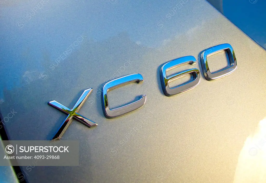 Exterior detail of a 2013 Volvo XC60 showing the badge logo.