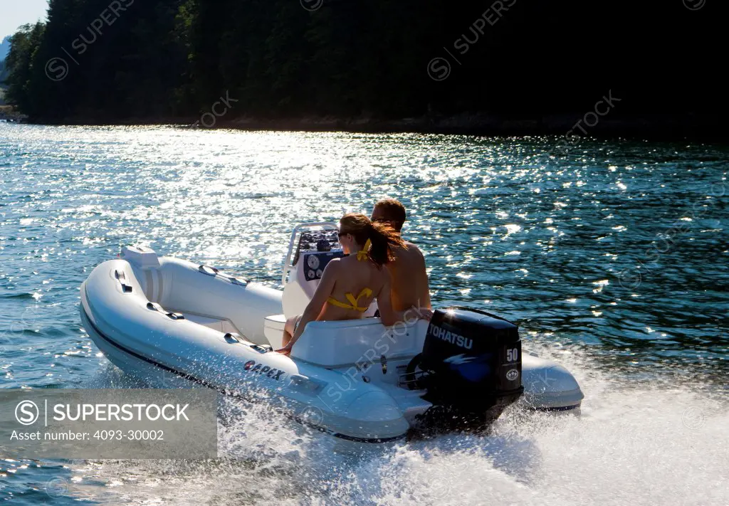 Couple boating on yale lake in Washington.