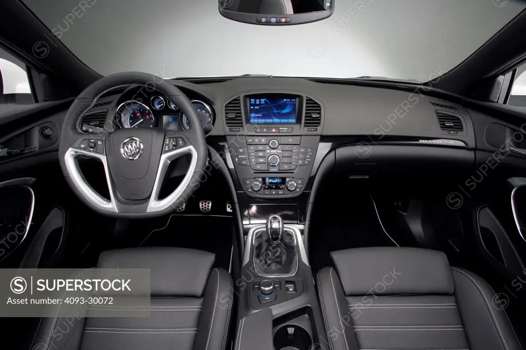 2011 Buick Regal GS Concept showing the steering wheel, instrument panel, dashboard, center console, gear shift lever and GPS navigation system