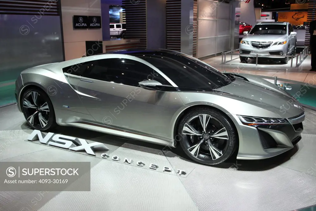 Front 3/4 static of a silver 2015 Acura NSX concept at the 2012 Detroit International Auto Show.