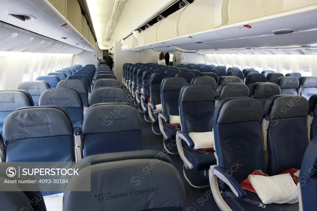 Delta Airlines Boeing 777 interior showing the coach or economy section.