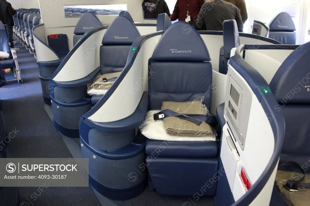 Delta Airlines Boeing 777 interior showing the Business Class section.
