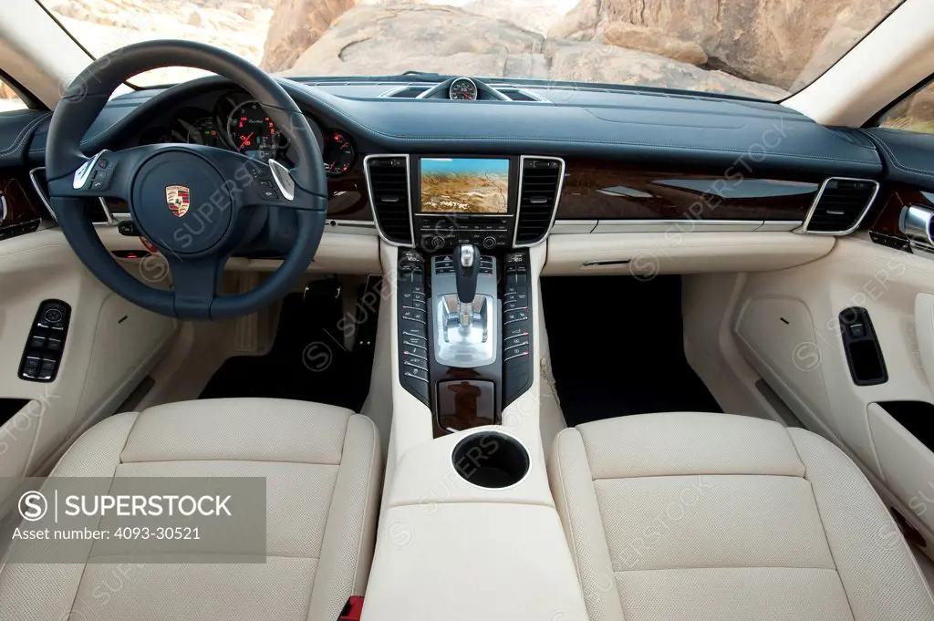 2010 Porsche Panamera Turbo interior view with dashboard and GPS