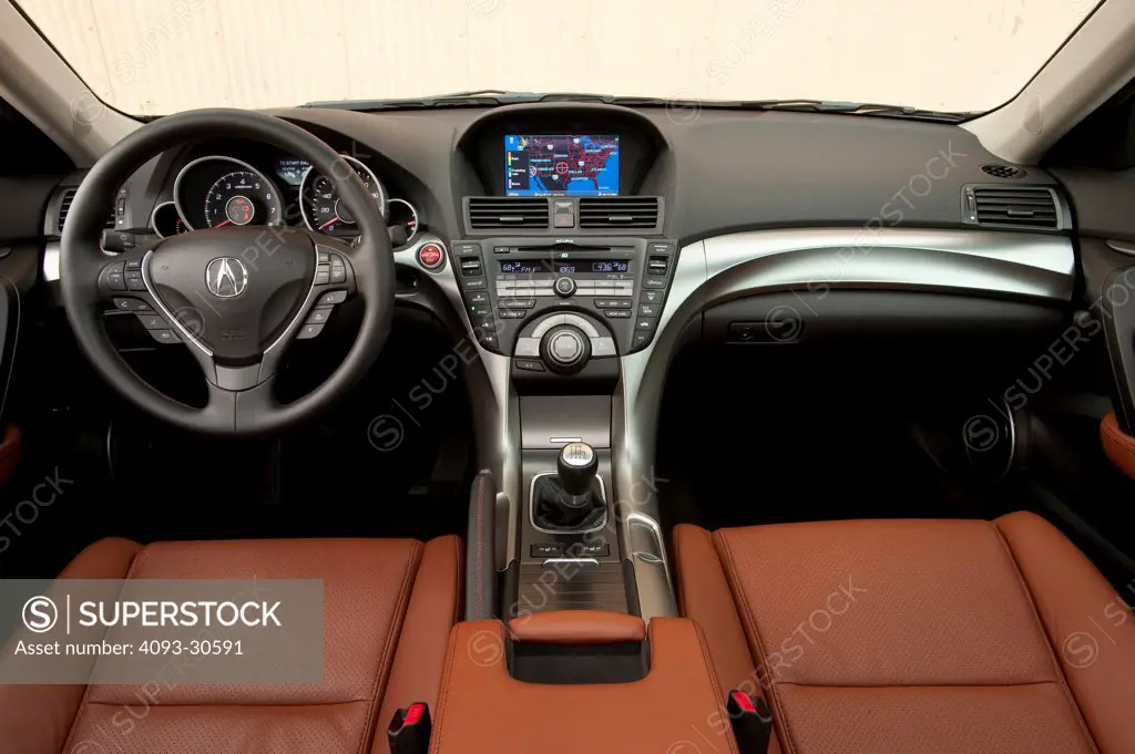 2011 Acura TL SH-AWD interior showing the steering wheel, instrument panel, dashboard, center console, GPS navigation and gear shift lever