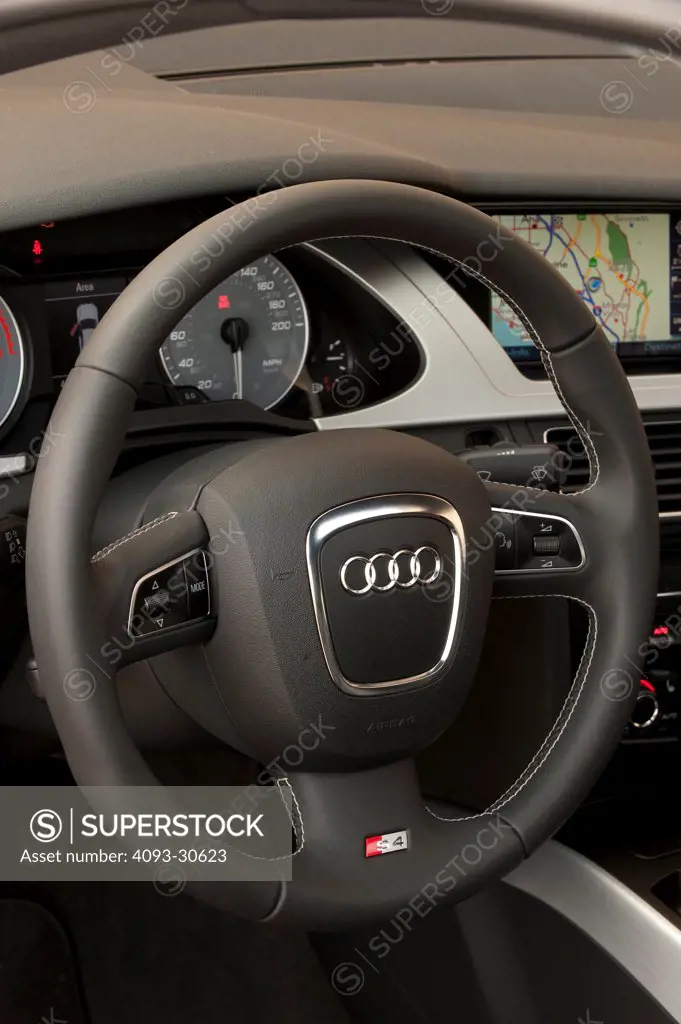 2011 Audi S4 interior showing the steering wheel and instrument panel