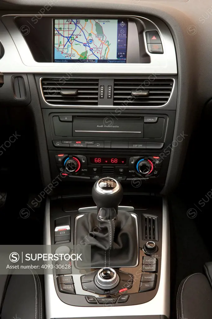 2011 Audi S4 interior showing the center console, GPS navigation, multi function knob and gear shift lever