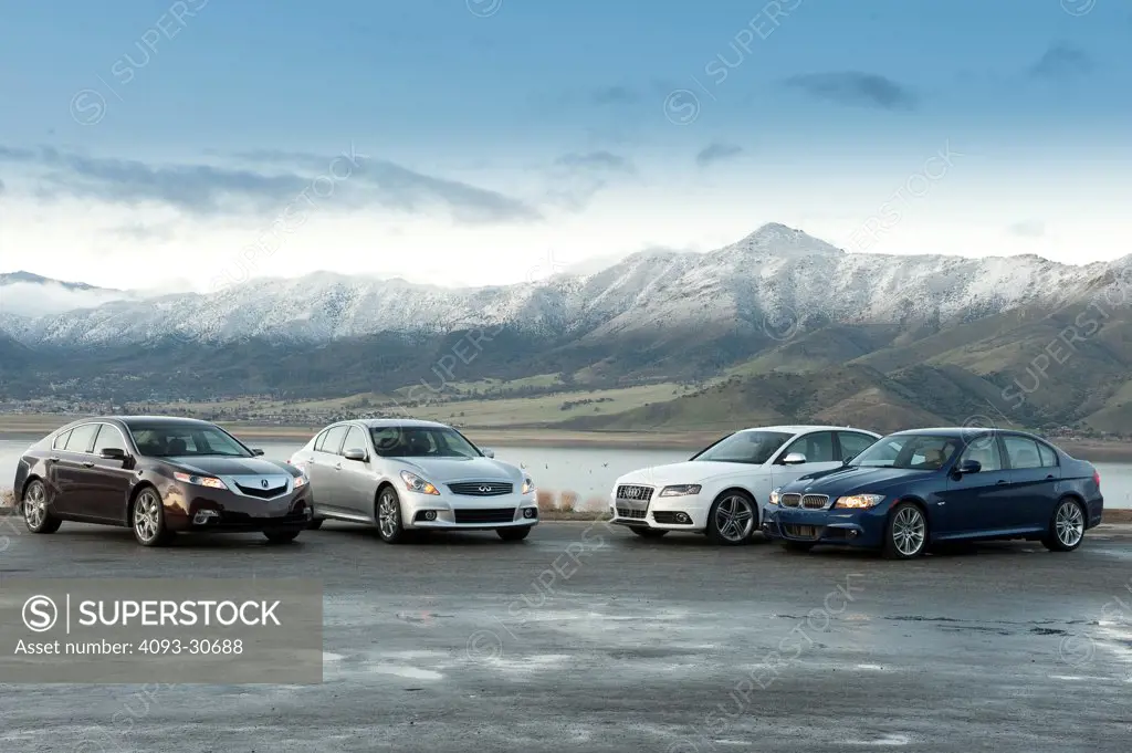 2011 Acura TL SH-AWD, Audi S4, BMW 335i and Infiniti G37S, four sports sedans parked in a rural location