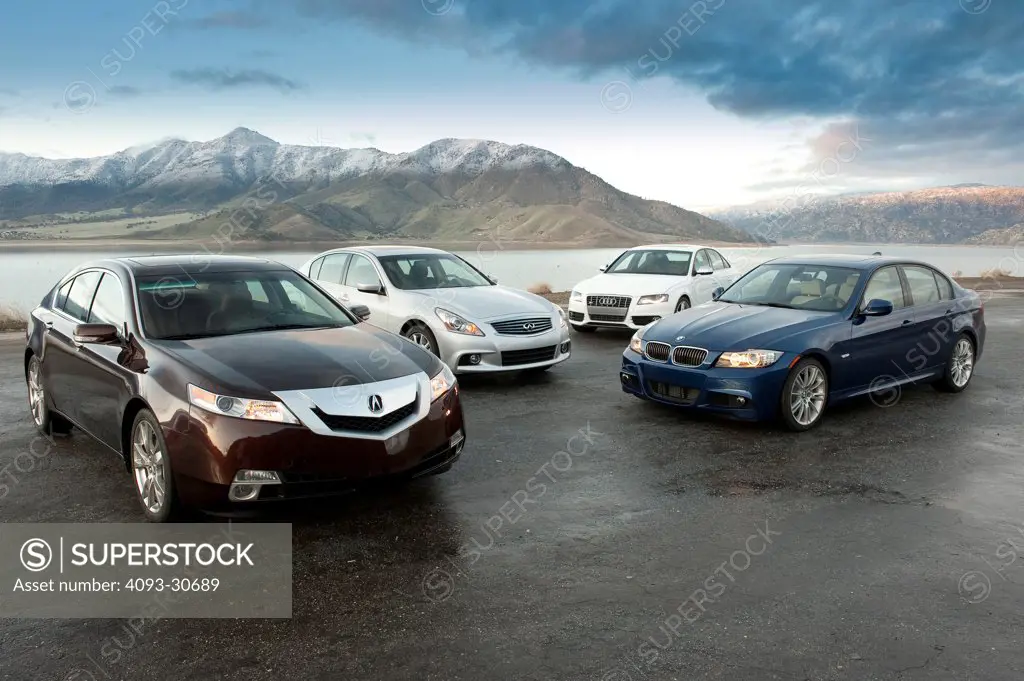 2011 Acura TL SH-AWD, Audi S4, BMW 335i and Infiniti G37S, four sports sedans parked in a rural location