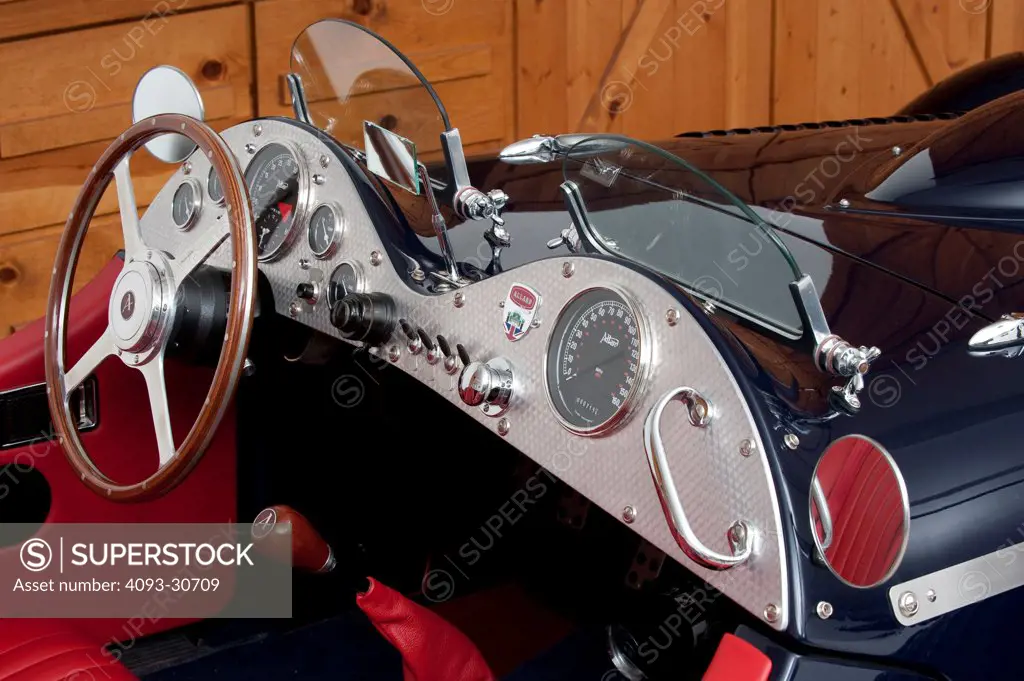 2011 Allard J2x MkII Commemorative Edition interior showing the steering wheel, instrument panel, dashboard and gear shift lever