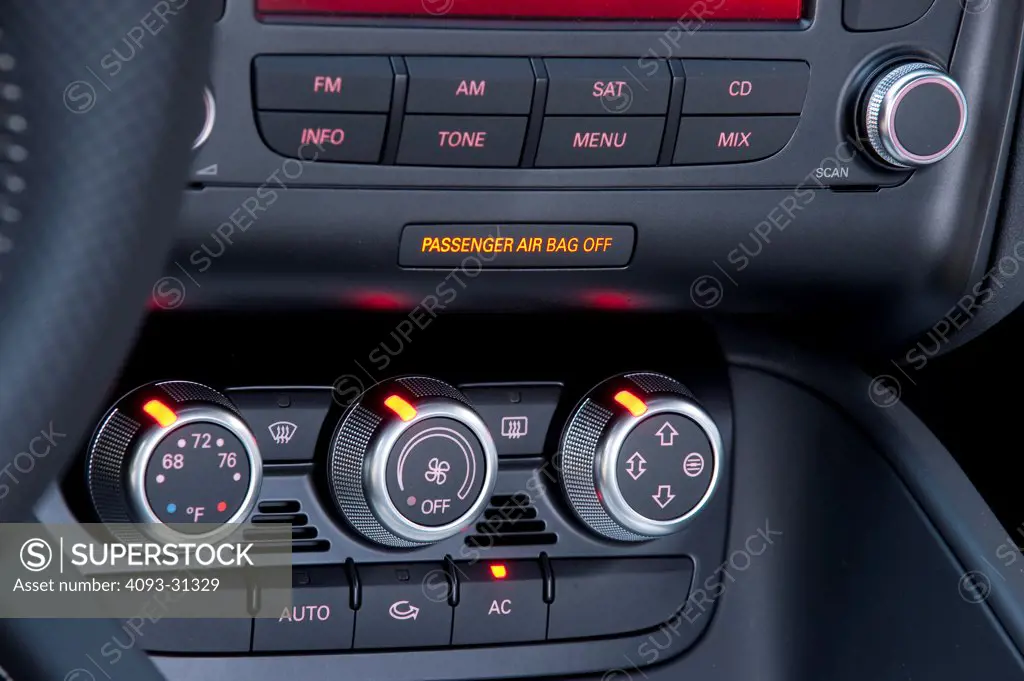 Detail view of the temperature controls and stereo of a 2012 Audi TT RS
