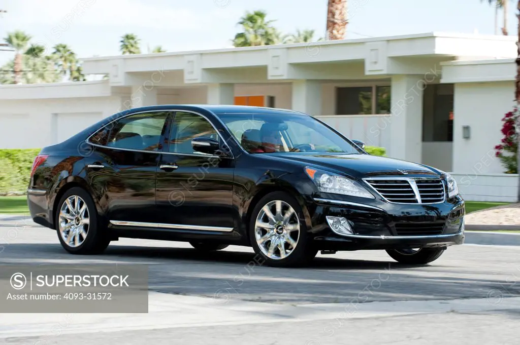 Front 7/8 view of a black 2012 Hyundai Equus in front of a modern house.