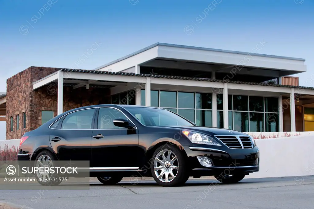 Front 7/8 view of a black 2012 Hyundai Equus in front of a modern house.