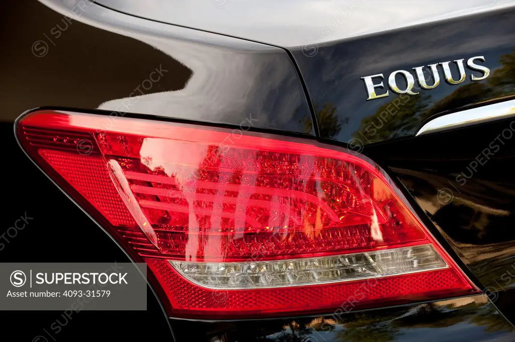 Detail view of the tail light and badge of a 2012 Hyundai Equus