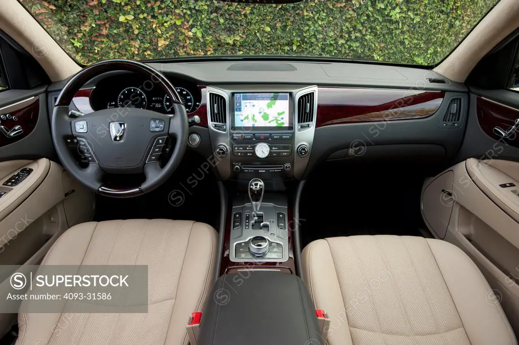 Interior view of the dash, steering wheel and seats of a 2012 Hyundai Equus