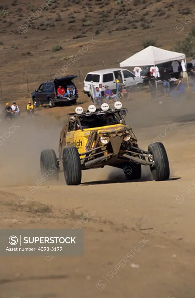 Baja 1000 C1 buggy yellow dust