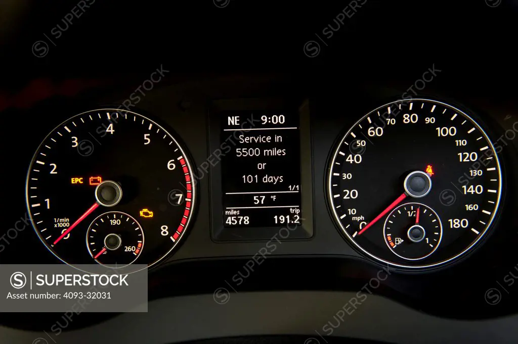 Detail of the Instrument Cluster showing the gauges of a 2012 Volkswagen Jetta GLI.