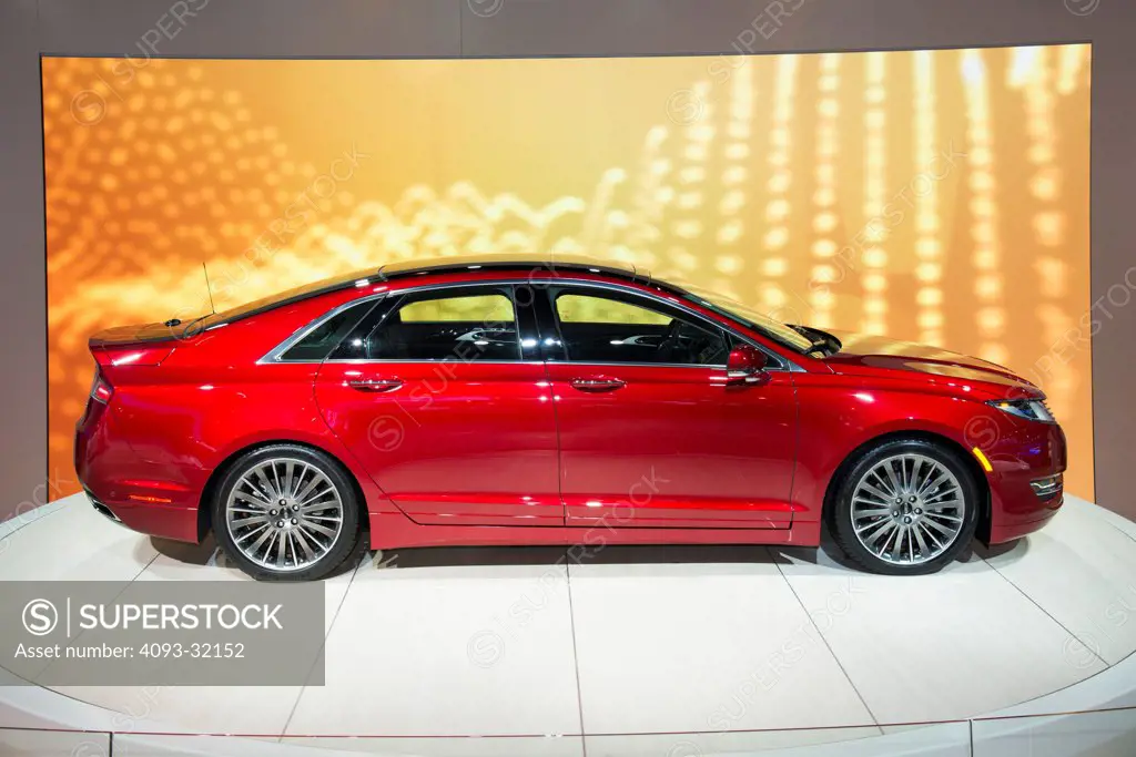 Profile view of a red 2013 Lincoln MkZ at the 2012 Los Angeles Auto Show
