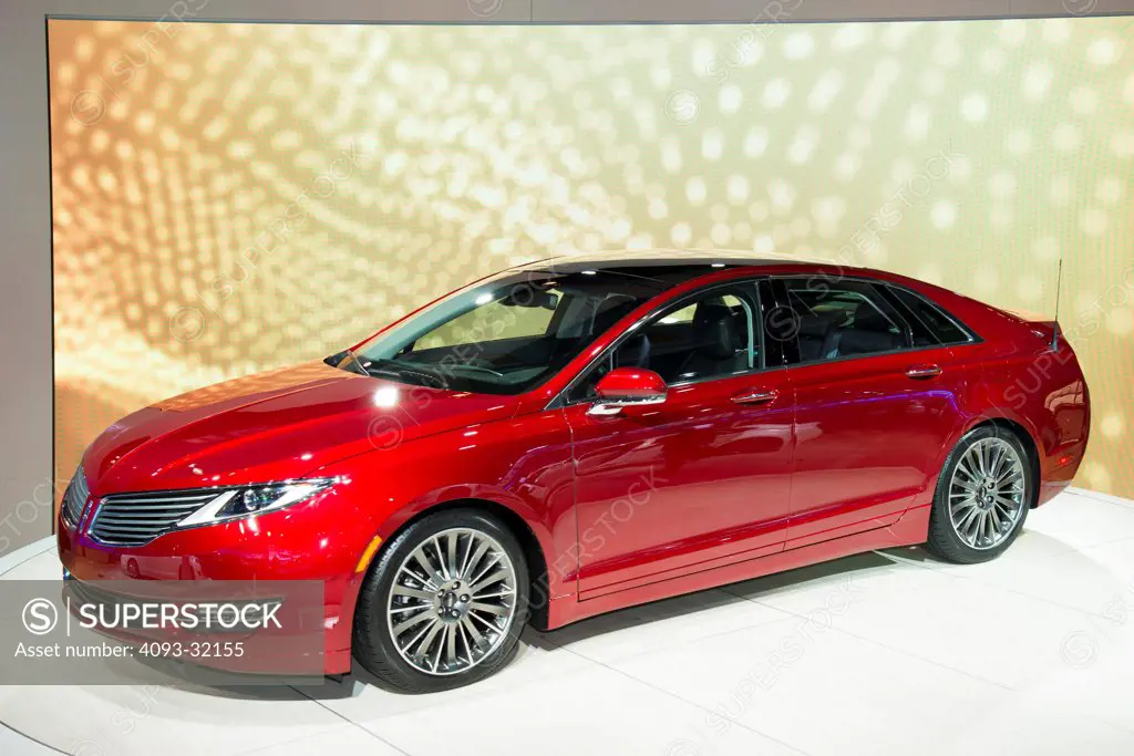 Front 7/8 view of a red 2013 Lincoln MkZ at the 2012 Los Angeles Auto Show