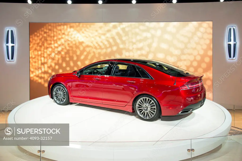 Rear 3/4 view of a red 2013 Lincoln MkZ at the 2012 Los Angeles Auto Show