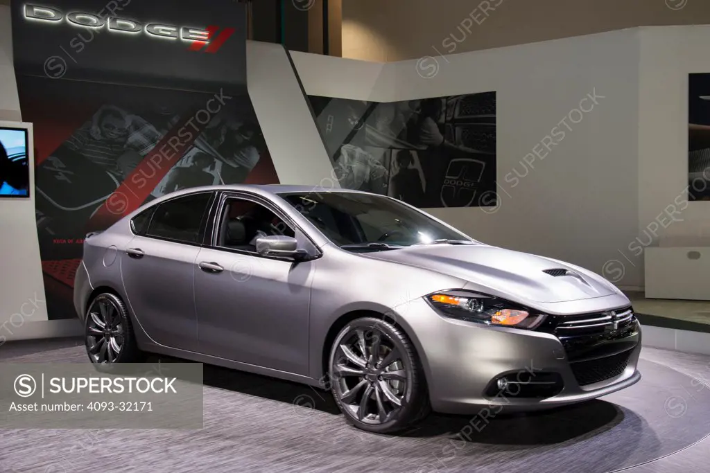 Front 3/4 view of a silver 2013 Dodge Dart at the 2012 Los Angeles Auto Show