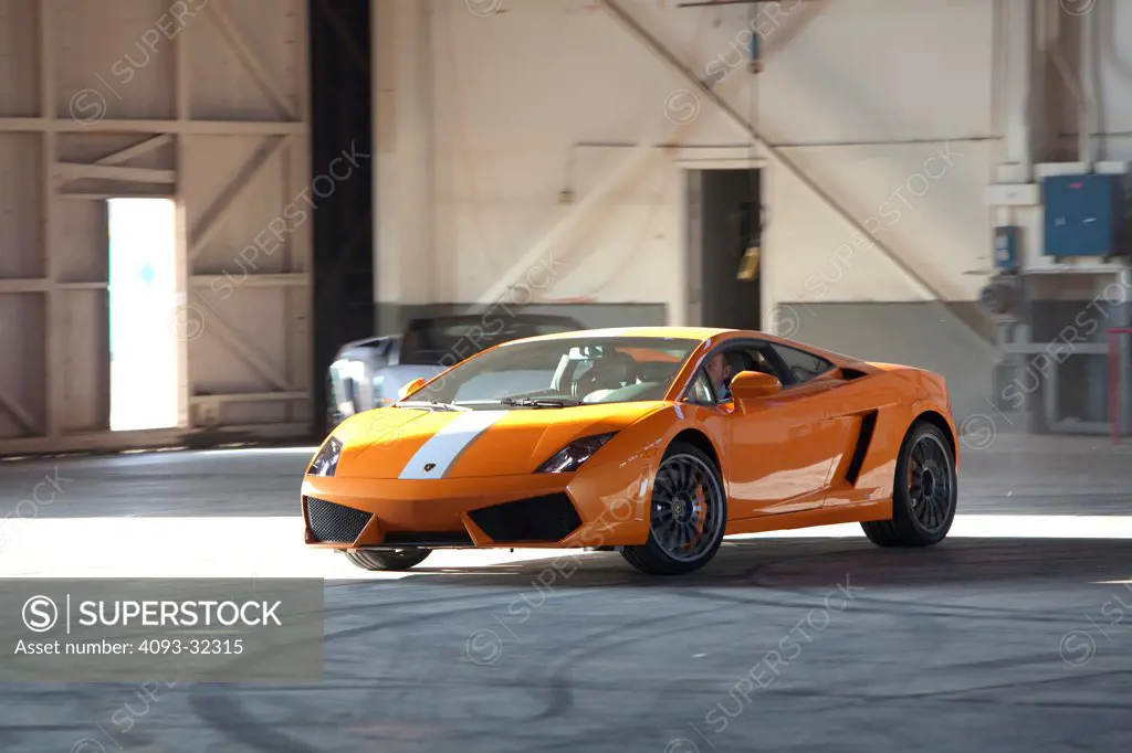 2010 Lamborghini Gallardo LP 550 in warehouse, front 3/4