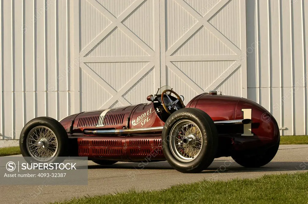 1939 Maserati 8CTF Boyle Special, winner of the 1939 Indy 500 race. Parked outside warehouse, rear 7/8