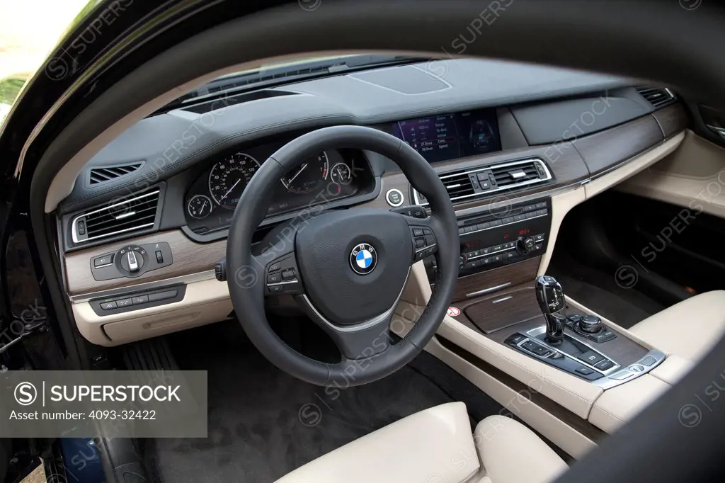 2011 BMW Active Hybrid 7 7-Series hybrid sedan, steering wheel, instrument panel, center console and dashboard.
