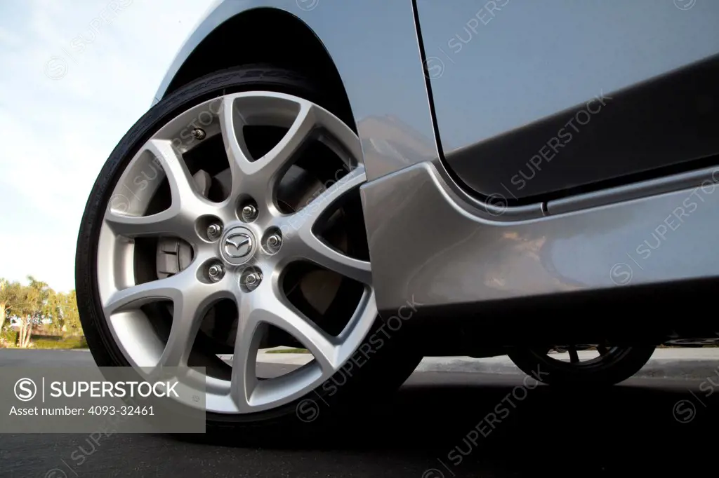 2011 Mazda 3 Mazda3 showing the front left wheel, tire, rim