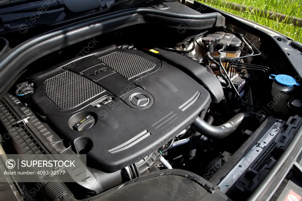 Engine view of a 2012 Mercedes-Benz ML350 showing the 3.5 liter 4-valve V6 motor.