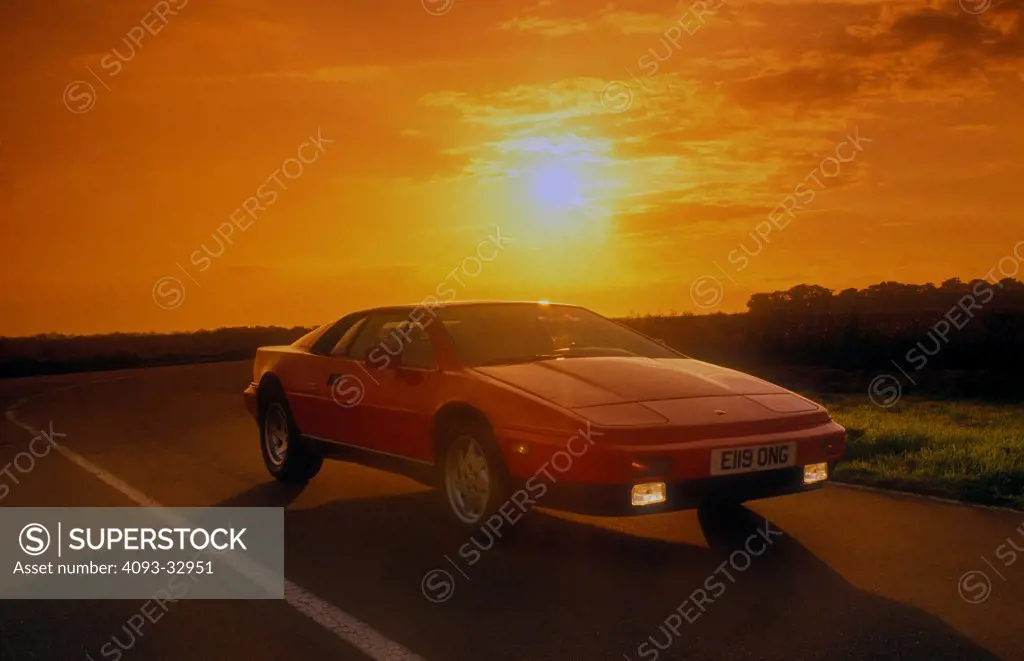 1987 Lotus Esprit Turbo Mk II on country road at sunset, front 3/4