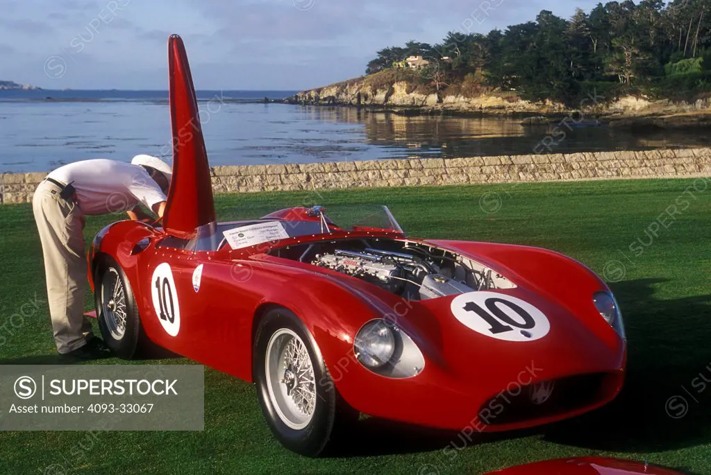1957 Maserati 300S being prepared by lake, front 3/4