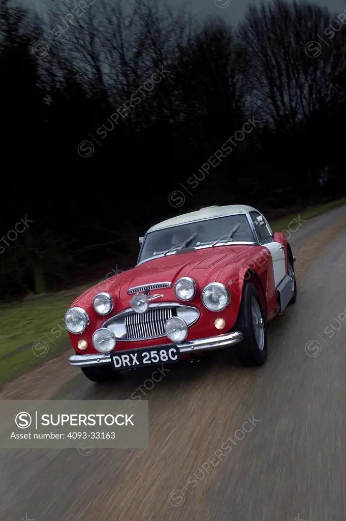1965 Works Austin Healey 3000 MKII on country road, front 7/8