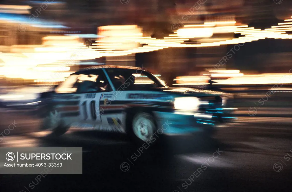 An Opel Ascona 400 rally car at speed at the 1982 Monte Carlo Rally, officially Rallye Automobile Monte Carlo.