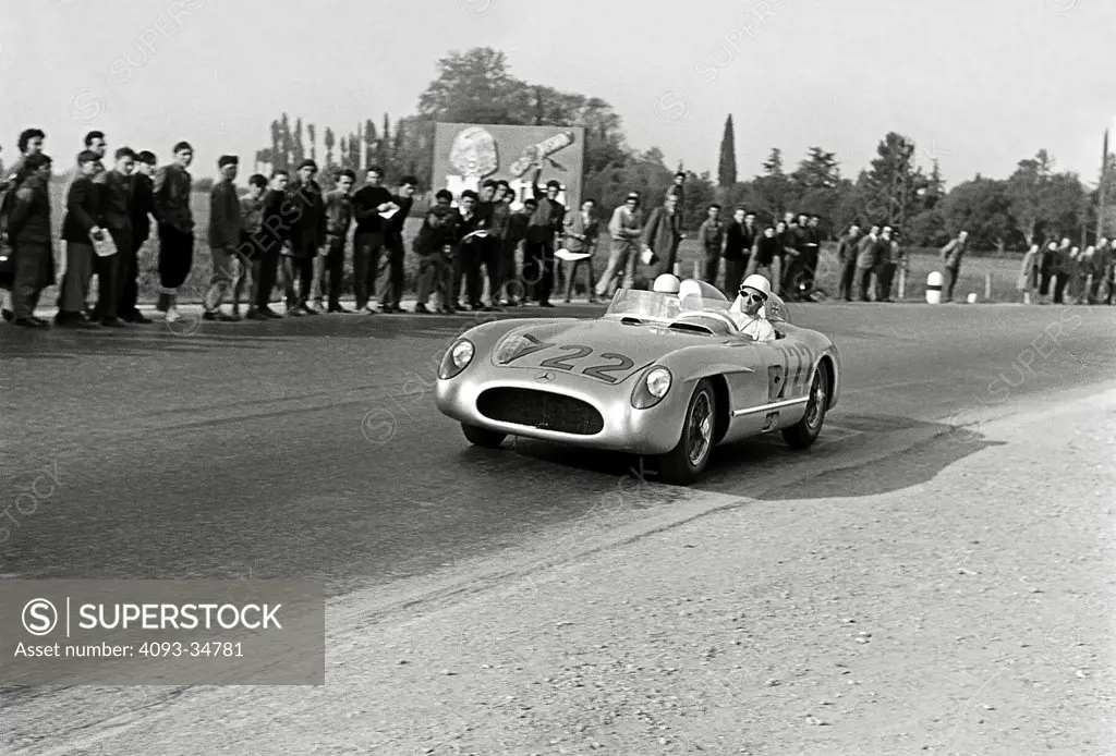 In one of history's great drives, Stirling Moss in the Mercedes-Benz 300SLR, partnered by Denis Jenkinson, dominated the 1955 Mille Miglia.
