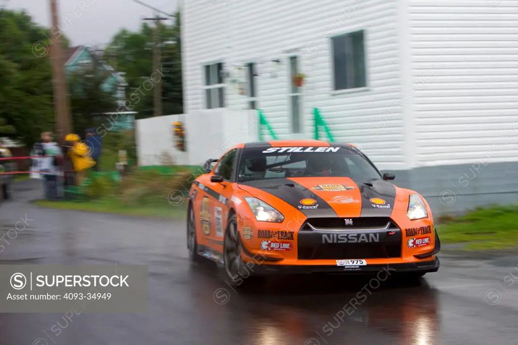 Front 3/4 action view of a 2010 Stillen Nissan GT-R racing at the Targa Newfoundland.