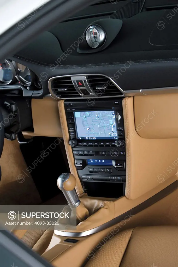 2010 Porsche 911 Turbo interior view of GPS and gear shift
