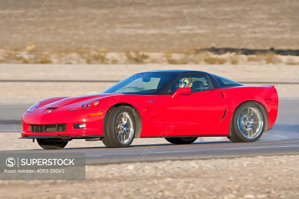 2010 Corvette ZR1 on desert road, front 7/8