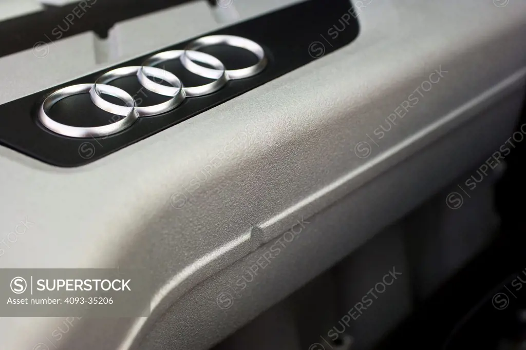2009 Audi R8 showing parts of the engine, badge logo