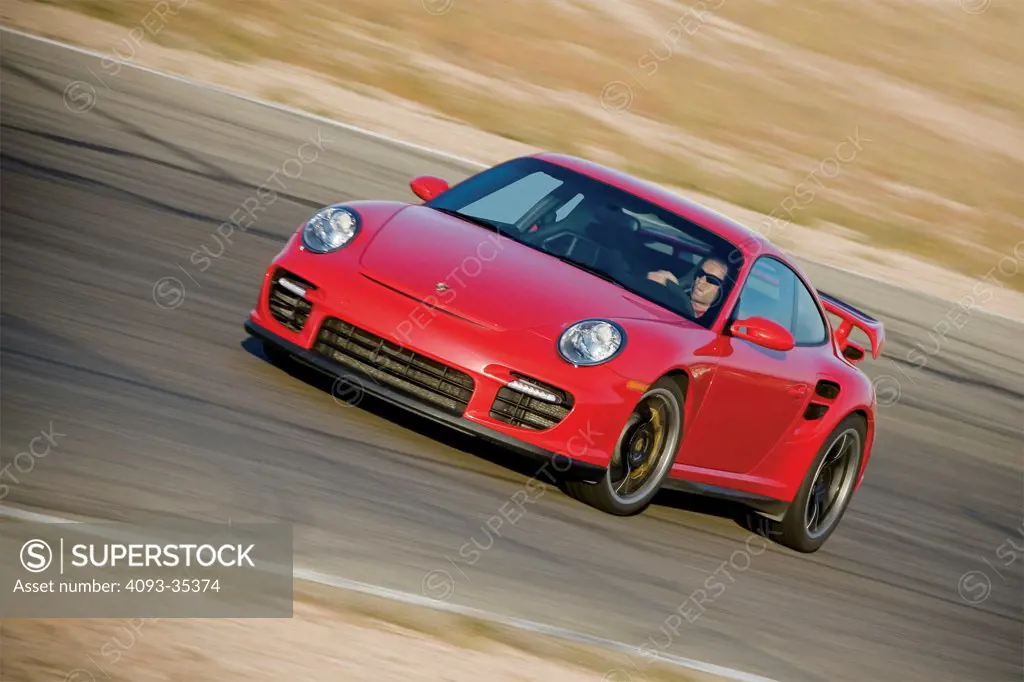 2008 Porsche 911 GT2 on the road, front 3/4