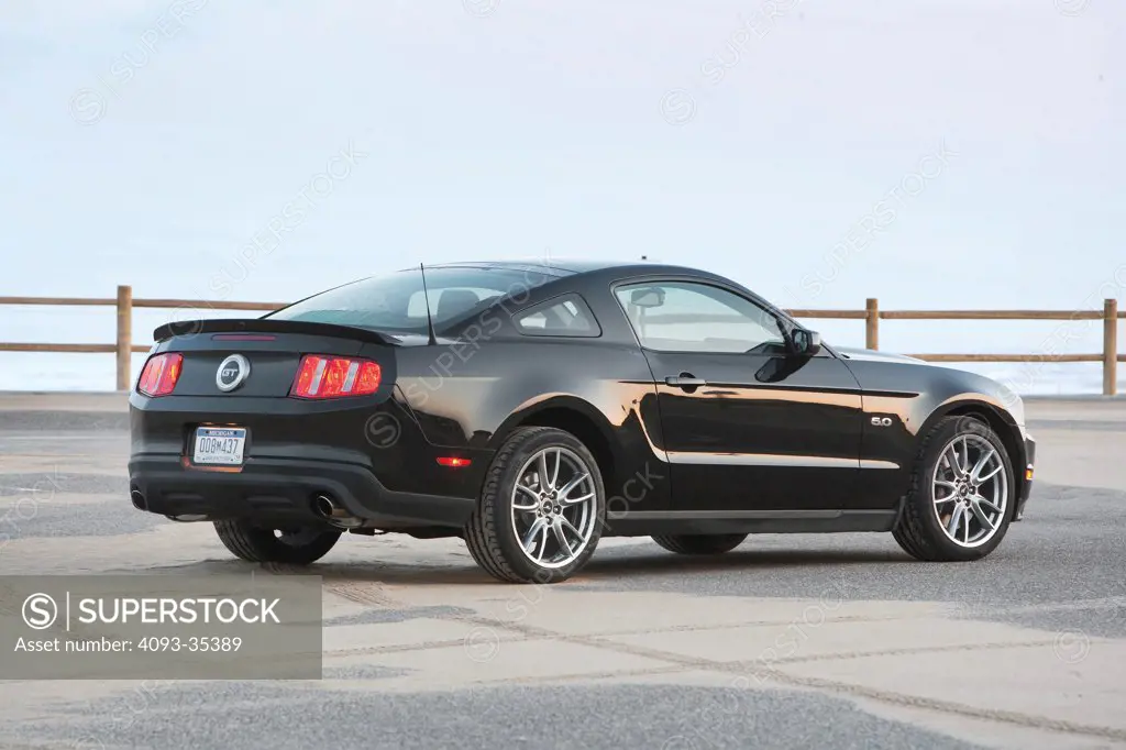 2011 Ford Mustang GT parked, rear 7/8