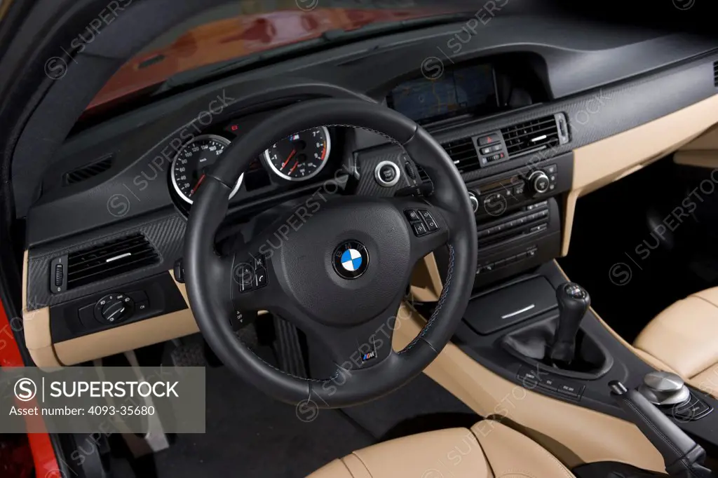 2008 BMW M3 showing the instrument panel, steering wheel, dashboard and center console