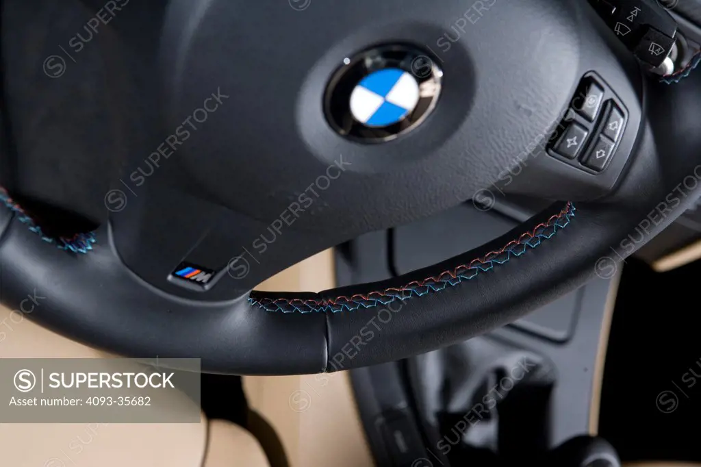 2008 BMW M3 showing the steering wheel and buttons on it